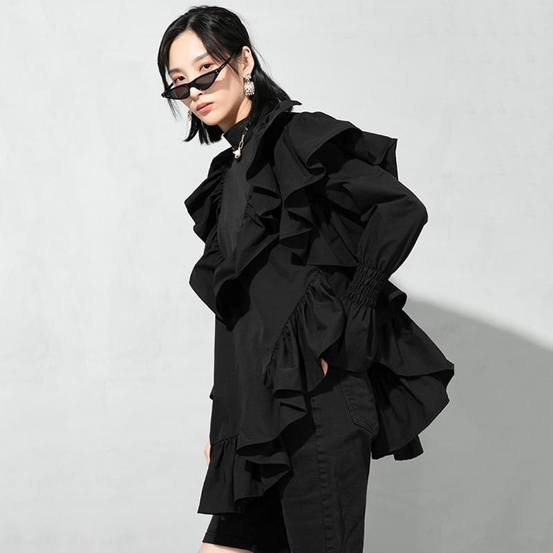 Marigold Shadows Blouses & Shirts Okimi Asymmetrical Ruffle Long Sleeve Shirt - Black