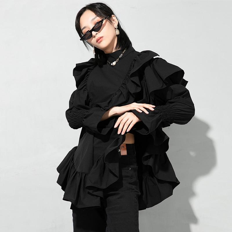 Marigold Shadows Blouses & Shirts Okimi Asymmetrical Ruffle Long Sleeve Shirt - Black