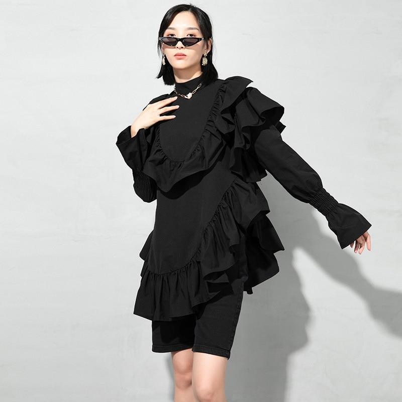 Marigold Shadows Blouses & Shirts Okimi Asymmetrical Ruffle Long Sleeve Shirt - Black