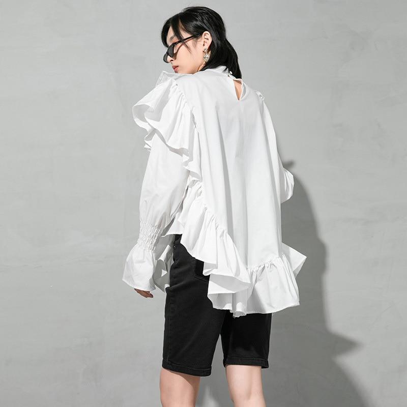 Marigold Shadows Blouses & Shirts Okimi Asymmetrical Ruffle Long Sleeve Shirt - White